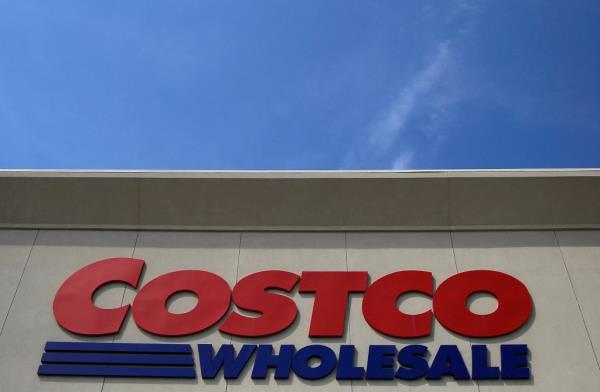 Costco Wholesale sign outside store.
